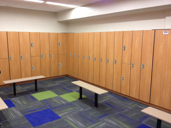 Phenolic lockers in a locker room with a natural cherry finish, by PSiSC.