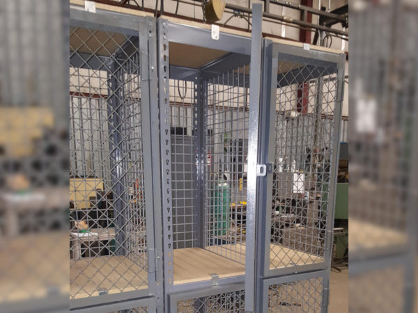 Lockers made from rivet shelving and wire partitions.