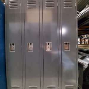 Used single-tier metal lockers with a gray finish.