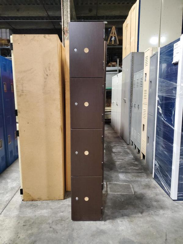 Used four-tier plastic laminate lockers with a wood style finish.