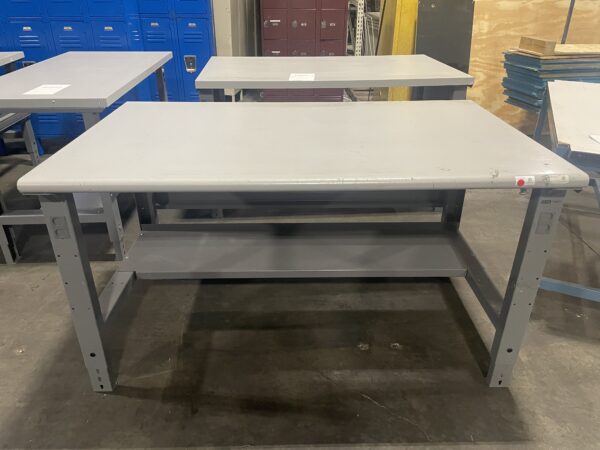 Multiple used workbenches with adjustable legs